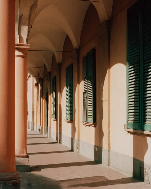 Portico street with terracotta columns in central Italy
